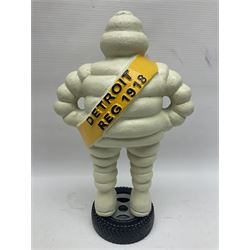 Cast iron figure of Michelin Man, stood on a tyre, H34cm 