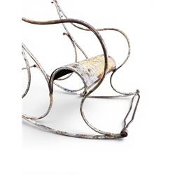Pair of large unusual 19th century wrought iron garden rocking chairs, simple scroll design, lacking canvas seat