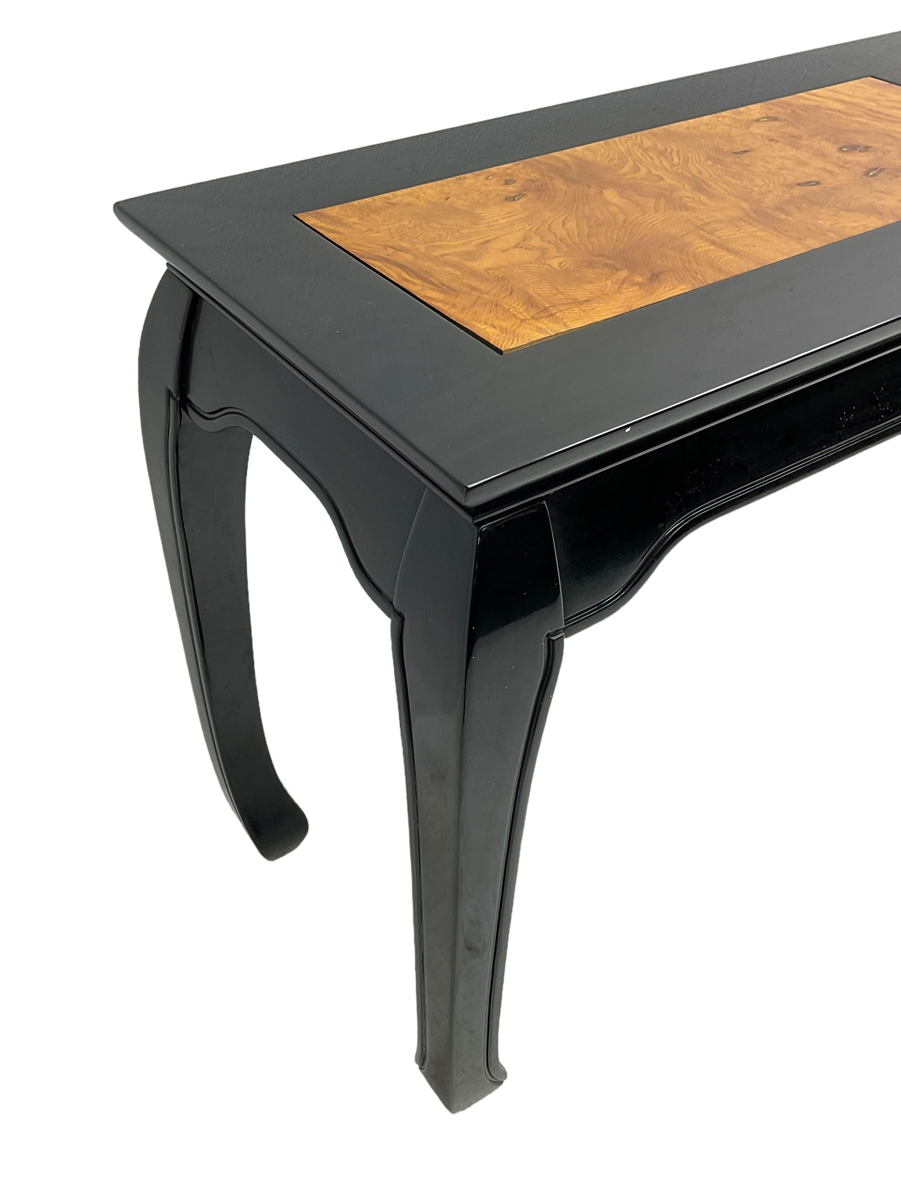 20th century Chinese ebonised lacquered console table, rectangular top with contrasting elm rectangular panels, shaped apron over curved supports