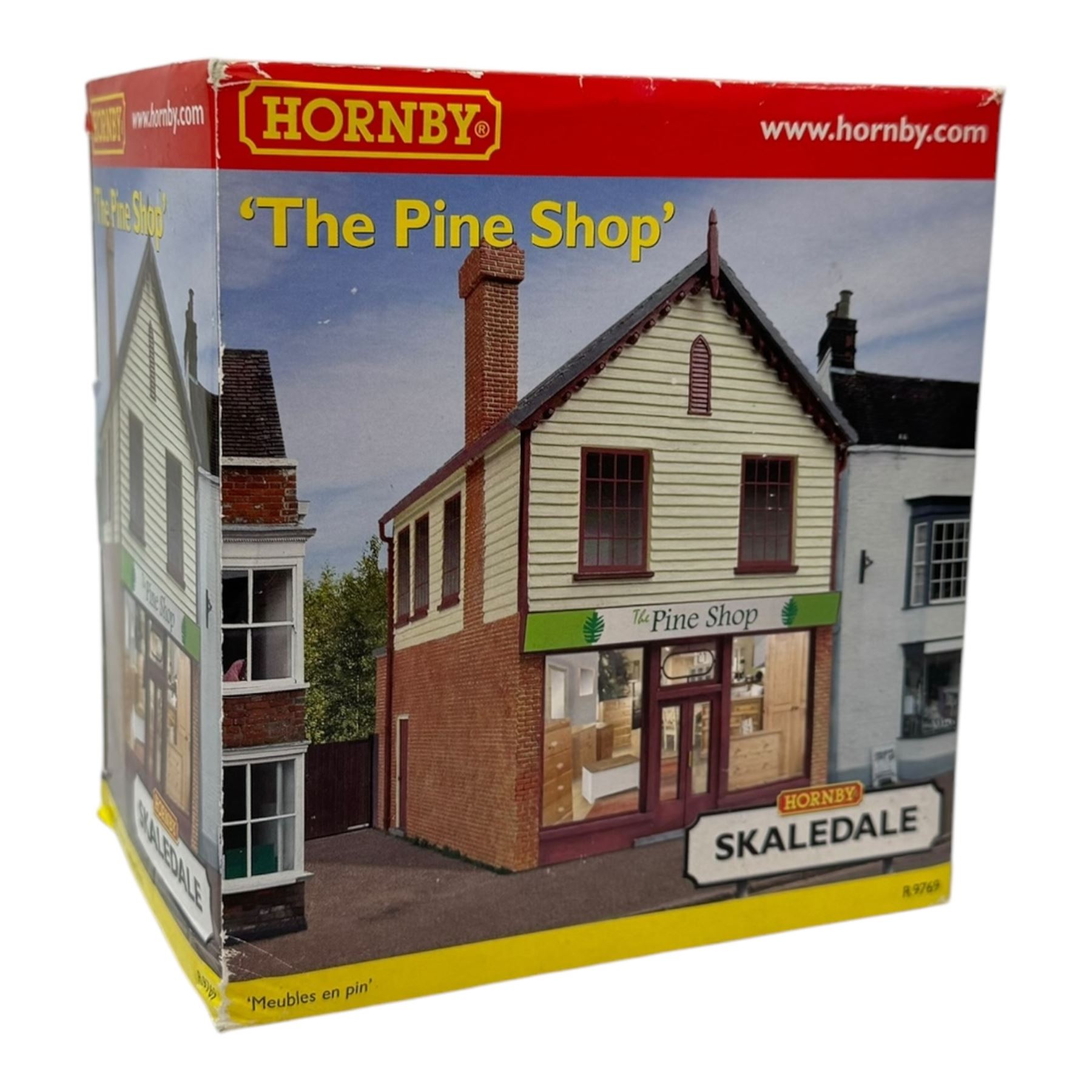 Ten Hornby '00' gauge Skaledale buildings, comprising R9834 Village Tea Rooms, R8506 Brambles Cottage, R8507 Platt's General Store, R8503 St Michaels School, R9769 The Pine Shop, R8641 Platform Footbridge, R8639 Water Tower, R8587 Coal Stage, R8589 Level Crossing Signal Box and R8638 Platform Shelter, all boxed