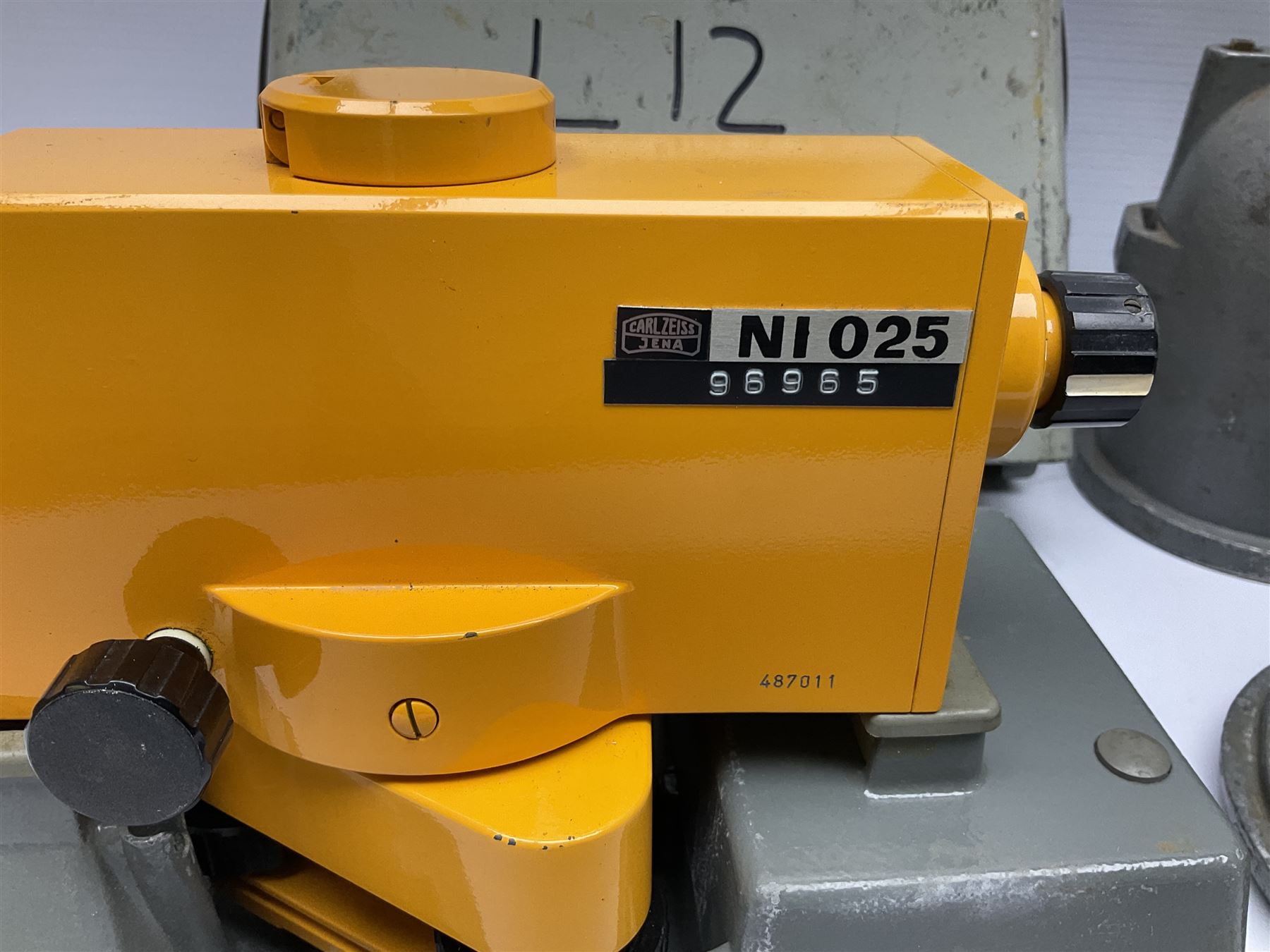Cooke Troughton & Simms Ltd. York surveyor's level Pat.No. 242468 serial no. SO35312 with grey painted brass body L20cm; in grey metal case with domed lift-off lid; and Carl Zeiss Jena Optical Level NI 025, serial no.487011 with mustard japanned metal body in grey metal case with domed lift-off lid (2)