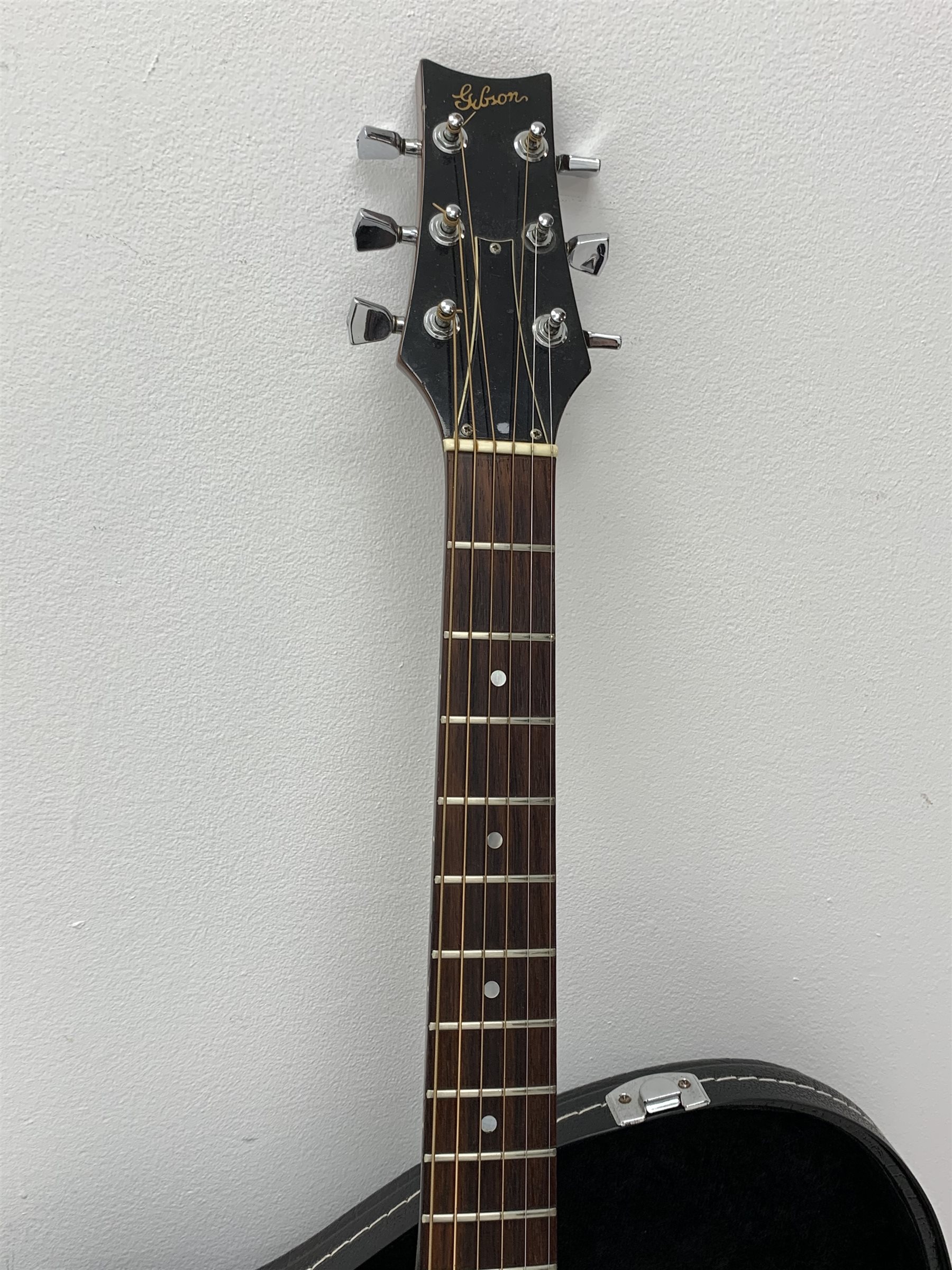 Rare Gibson Mk 35 acoustic guitar with mahogany back and sides, rosewood fingerboard, spruce top, fan-patterned bracing, nickel plated hardware and dot inlays, serial number 859651 in carrying case 