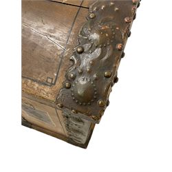 19th century painted oak sea chest, hinged dome top enclosing small compartment, bound by shaped and pressed metal strapwork, scumbled finish to resemble oak and painted with small vignettes depicting portraits and landscapes within panels, fitted with large wrought metal carrying handles, the front inscribed 'H.J.S. 1870' 