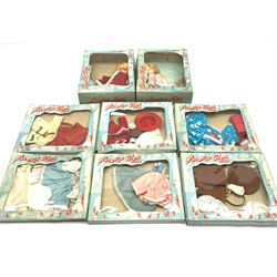 Faerie Glen - Sally doll boxed with 1959 catalogue and another wearing a red velvet coat and boxed with additional ice skating boots; together with six boxed outfits (8)