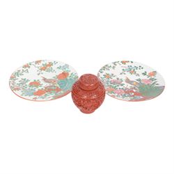 Near pair of Japanese plates, decorated in green, blue and iron-red enamels, with peacocks...