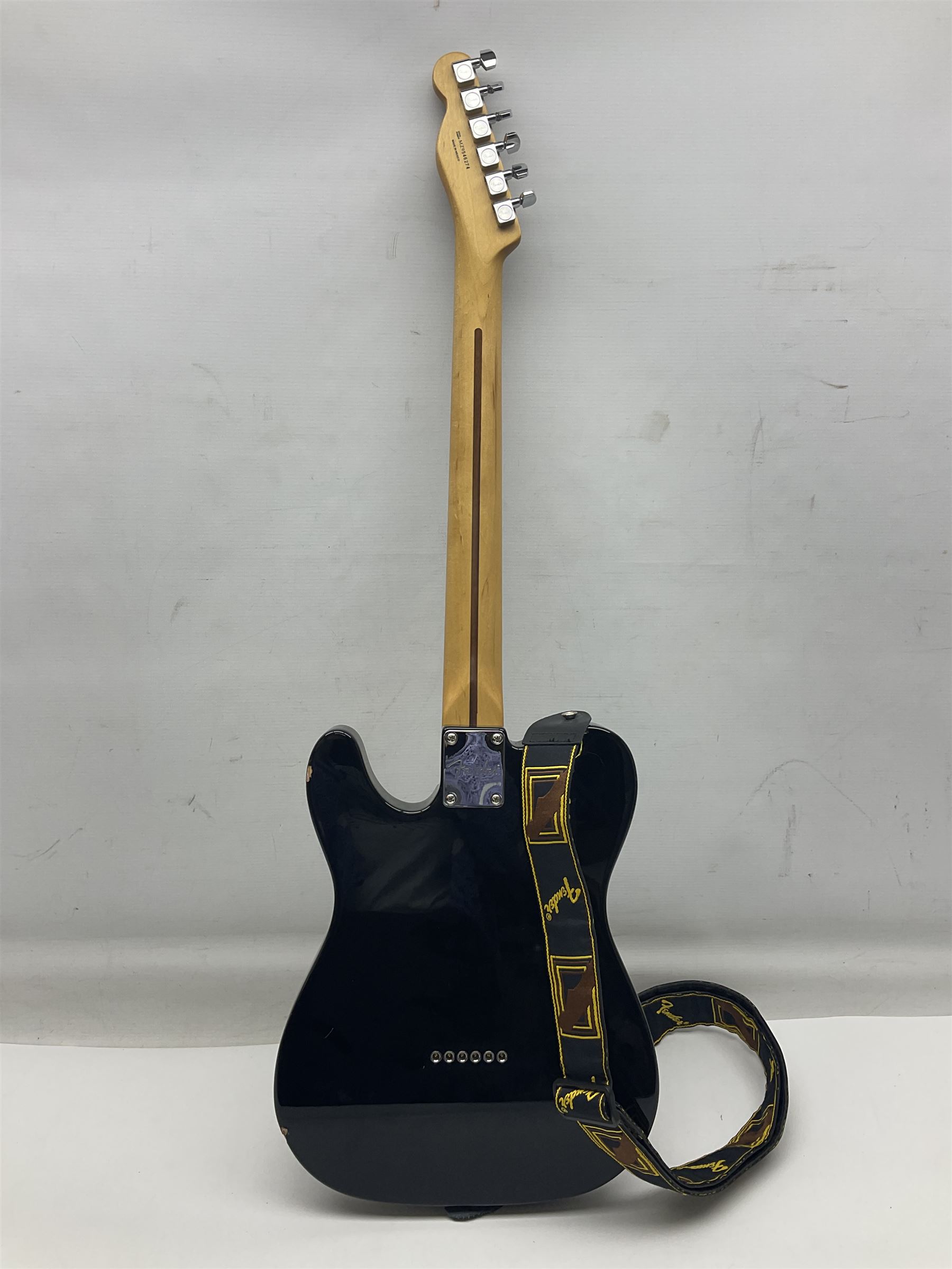 2009 Fender Telecaster electric guitar in black, retro fitted with Charlie Christian copy pick-up, serial no.MZ9546274; L98cm; in Fender soft carrying case