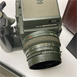 Zenza Bronica ETRS camera body, safari edition, serial no. 7100811, with 'Zenza Bronica Zenzanon EII 1:2.8 f=75mm' lens, serial no. 7908591, film magazine back, safari, serial no. 8100564, AE-ii metering head, safari, serial no. 617024, etc, all in leather case