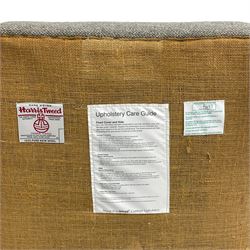 Interiors at Nine to Eleven - Edwardian design armchair, traditional shape with rolled arms, upholstered in 'Harris Tweed' fabric with leather piping, raised on square taping supports with castors