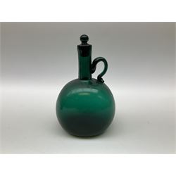 Two 19th century green and blue glass decanters, each of bottle form with handle to the neck and shoulder, and stopper, H20cm