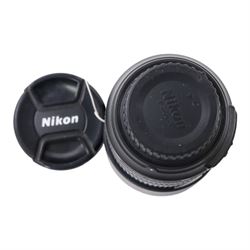 Nikon D7100 DSLR camera body, serial no. 2522259, with an AF-S Nikkor 18-105mm 1:23.5-5.6G ED lens, boxed with strap