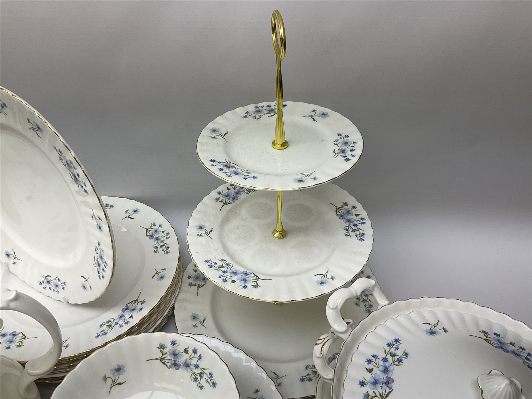 Extensive Richmond Blue Rock pattern part tea and dinner service, to include seven dinner plates, nine smaller plates, three lidded twin handled tureens, two teapots and two coffee pots, eleven bowls, cake stand, six twin handled soup bowls and saucers, six teacups, four coffee cups, milk jugs, sucrier, cake plate, salt and pepper shakers, other plates, dishes, bowls, side plates and many spares etc