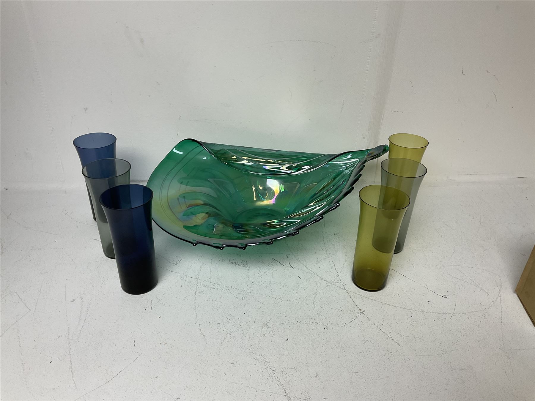 Large green studio glass conch shell bowl, with lustre finish, together with six coloured glasses, bowl W44cm