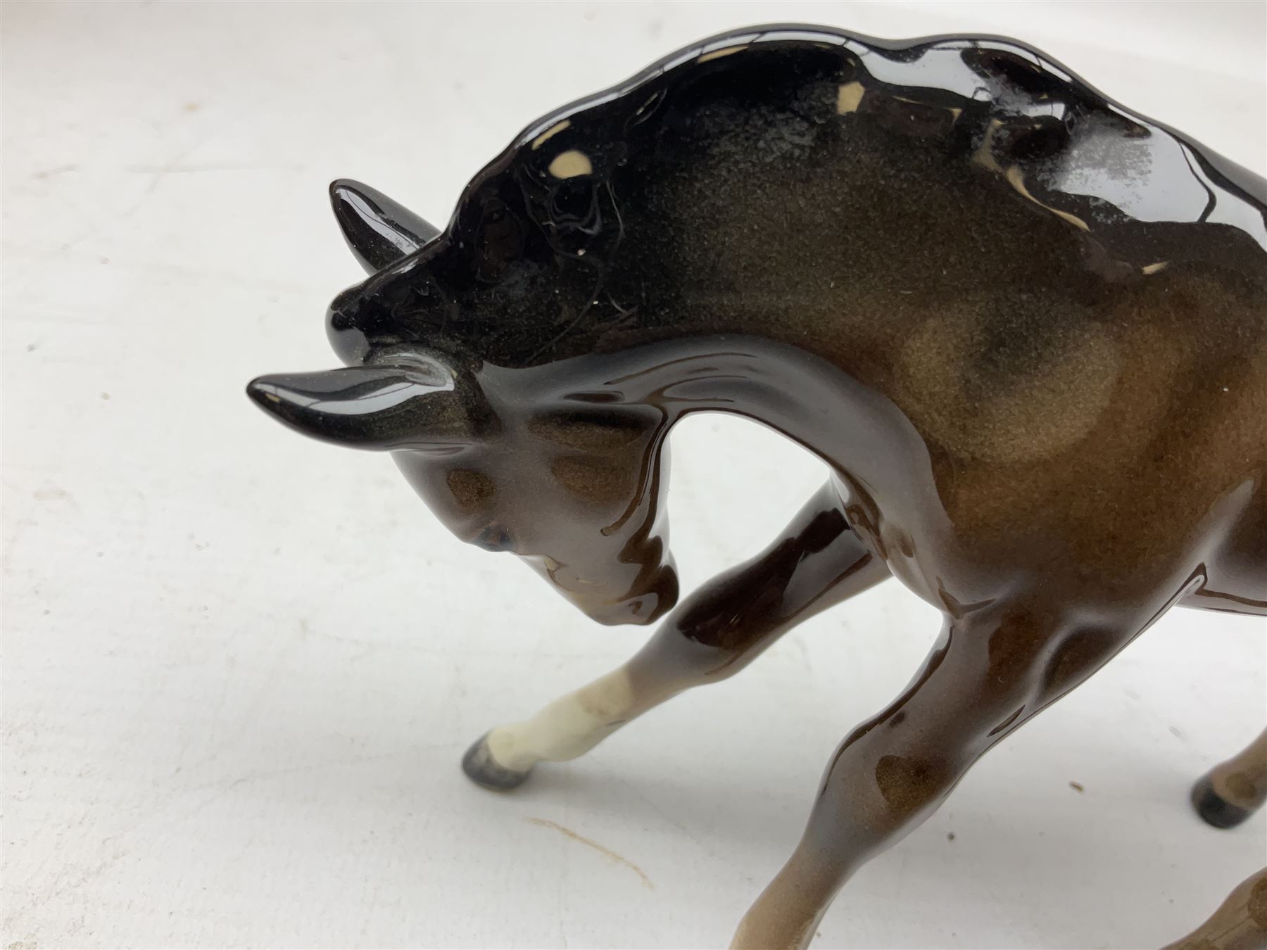 Six Beswick figures of bay horses, including large hunter no.1734, Shire horse no.818, horse with tucked head no.1549, etc (6)