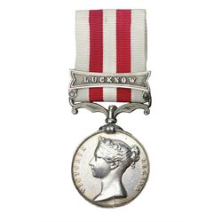 Victoria India Mutiny Medal 1857 - 1858, name erased, with Lucknow clasp and ribbon