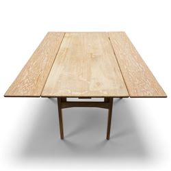 20th century Scandinavian limed oak metamorphic dining-to-coffee table, the rectangular extending top with draw-leaf sides, over an adjustable-height action base, on splayed supports united by stretchers