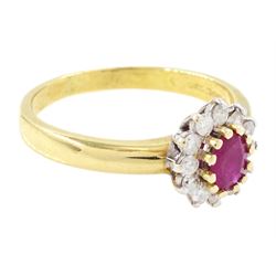 18ct gold ruby and diamond cluster ring, single oval cut ruby of approx 0.25 carat, surrounded by twelve round brilliant cut diamonds, hallmarked, total diamond weight 0.25 carat
