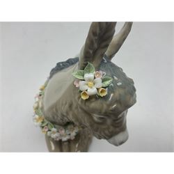 Lladro figures of animals, comprising Mini Lion no 5436, Beautiful Burro no 5683, Hawk Owl no 5422, Beagle Puppy Sitting no 1071, Duck Flying no 1264, Miniature Cat no 5308 and Small Papillon Dog no 4749, four with original boxes, largest example H14cm