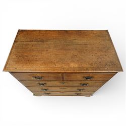George III oak chest of drawers, the plain moulded top above a two over three drawer arrangement with pierced brass fittings, the case raised on bracket feet