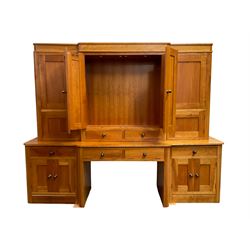 Large contemporary cherry wood break-front wall unit, the banded cornice over double cupboard with bifold doors and two drawers, flanked by four single cupboards, the base fitted with four drawers over four cupboards (W263cm, H216cm, D68cm); and a cherry wood cabinet, fitted with double cupboard over two short and two long drawers, with faux drawer facias (W81cm, H138cm, D66cm)