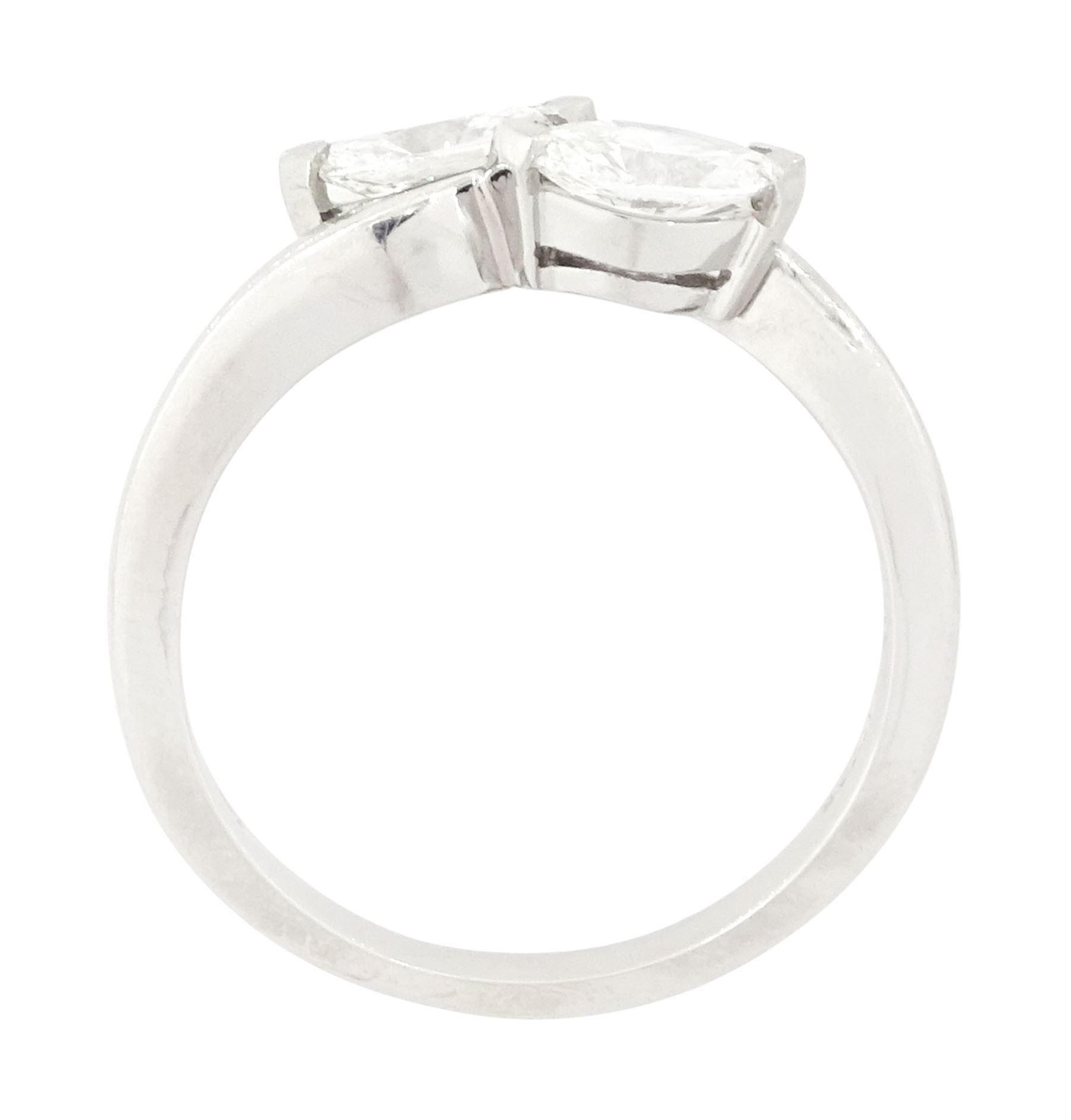 Platinum diamond crossover ring, set with two marquise cut diamonds, London 2010, total diamond weight approx 0.80 carat