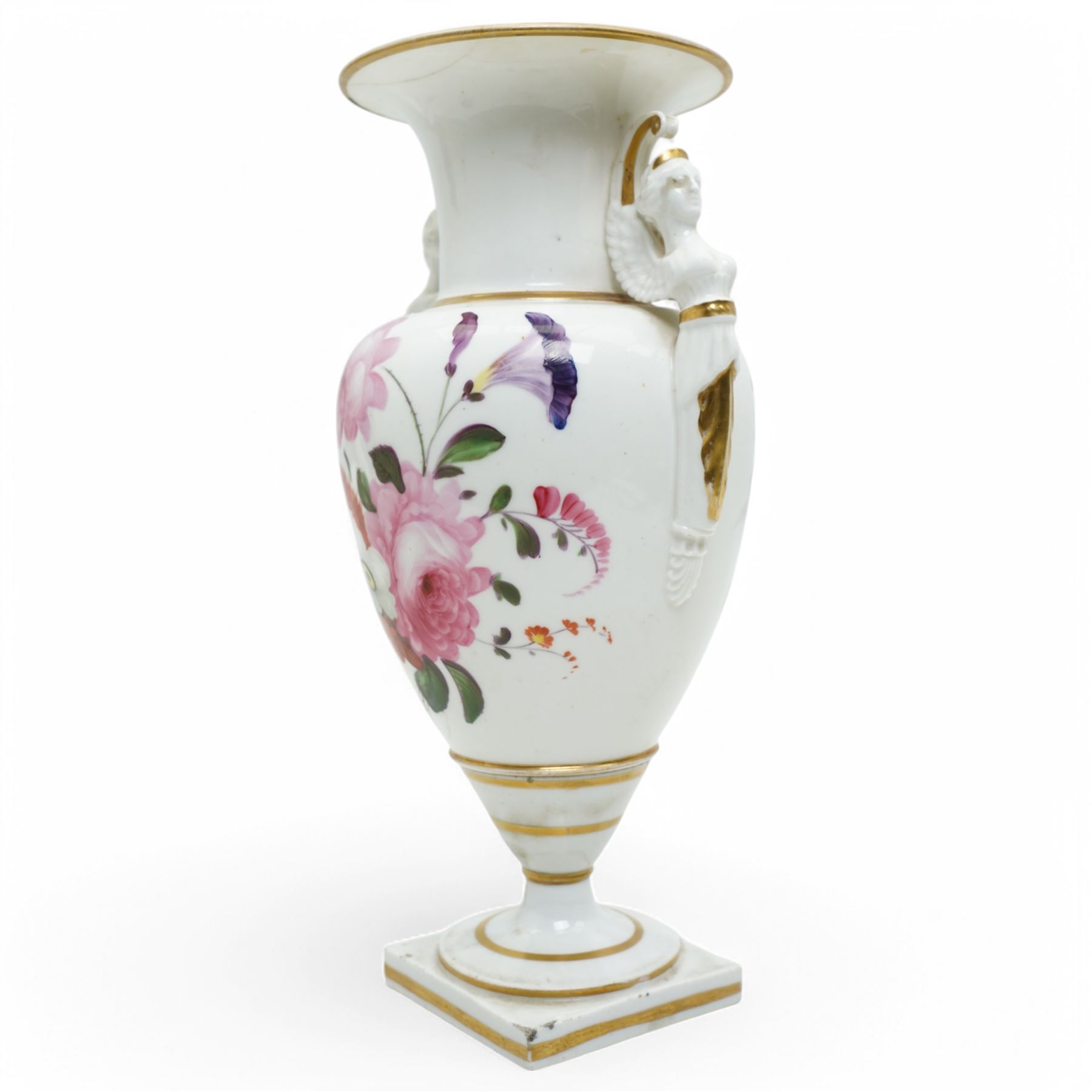 Early 19th century porcelain baluster vase, hand painted with roses, tulips etc having winged caryatid handles, H27cm. Old paper label from D.M. &  P. Manheim inscribed 'Derby'