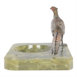 After Franz Bergman, 20th century cold painted bronze, of a pheasant, mounted on an onyx ashtray, H13cm, L22cm