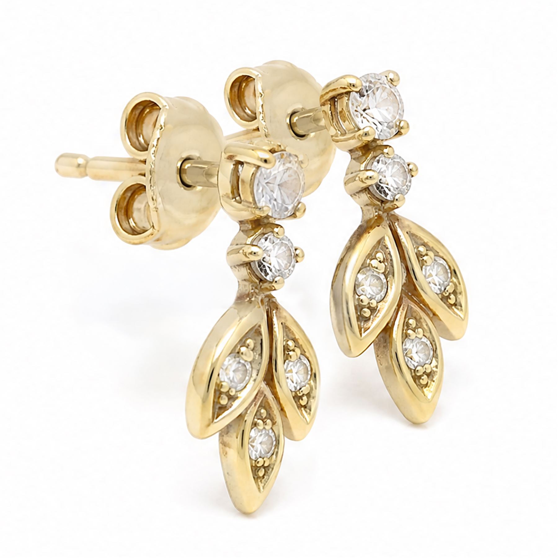 Pair of 18ct gold diamond leaf design earrings, each stud with diamond set leaves, suspending from two round brilliant cut diamonds, Sheffield import mark 1989, total diamond weight approx 0.40 carat