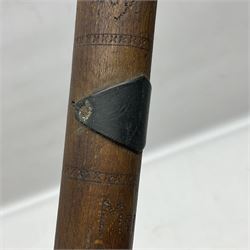 WW1 Prisoner of War carved beech walking cane, the terminal as a head wearing a helmet, and inscribed 'Souvenir from 370th PoW Coy Menin 1919'; bears metal plaque with indistinct monogram L91cm
