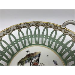 Pair of 19th century German openwork chestnut baskets, with twin handles and scrolling gilt border and star rim, painted to the centre with birds and insects, D22cm 