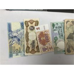 Great British and World coins and banknotes, including pre-decimal coinage, Britain's first decimal coins sets in blue folders, silver one yen coin converted into a brooch, commemorative crowns etc