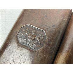 Victorian leather cigar protector with metal match striking plate on the end and internal spring to hold the cigars in place; expands for differing lengths of cigar, minimum L12.5cm; another similar leather cigar case marked Middlemore's Patent with attached vesta case and striker; three Bryant & Mays tin-late matchbox holders including 1935 Jubilee; and small box of matches (6)