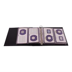 Twenty-five United States of America silver one dollar coins, comprising eighteen 'Morgan' and seven 'Peace' dollars, in 'The U.S. Silver Dollar Collection' ring binder