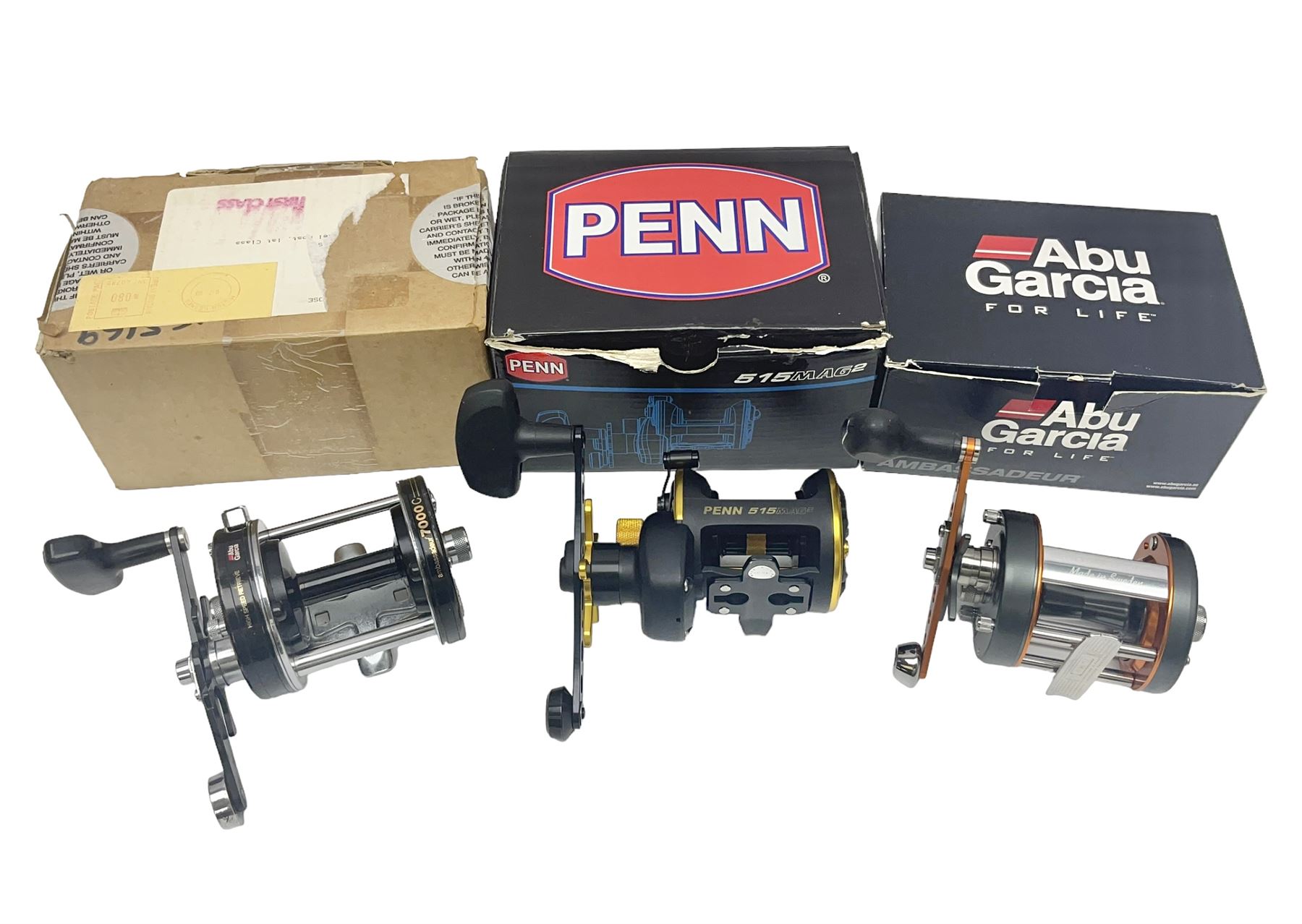 Three multiplier spool sea fishing reels, to include Swedish Abu Ambassaduer 700c Black, with spare spool, Swedish Abu Garcia Ambassadeur 6500 C3 CT MAG and Penn 515 MAG2, all boxed