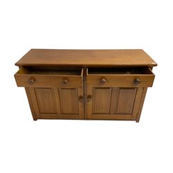 JAS Brister & Co Ld - Mid-20th century teak sideboard, fitted with two drawers over two panelled cupboards, stamped 'JAS. Brister & Co Ltd., Complete House Furniture, Port Elizabeth'