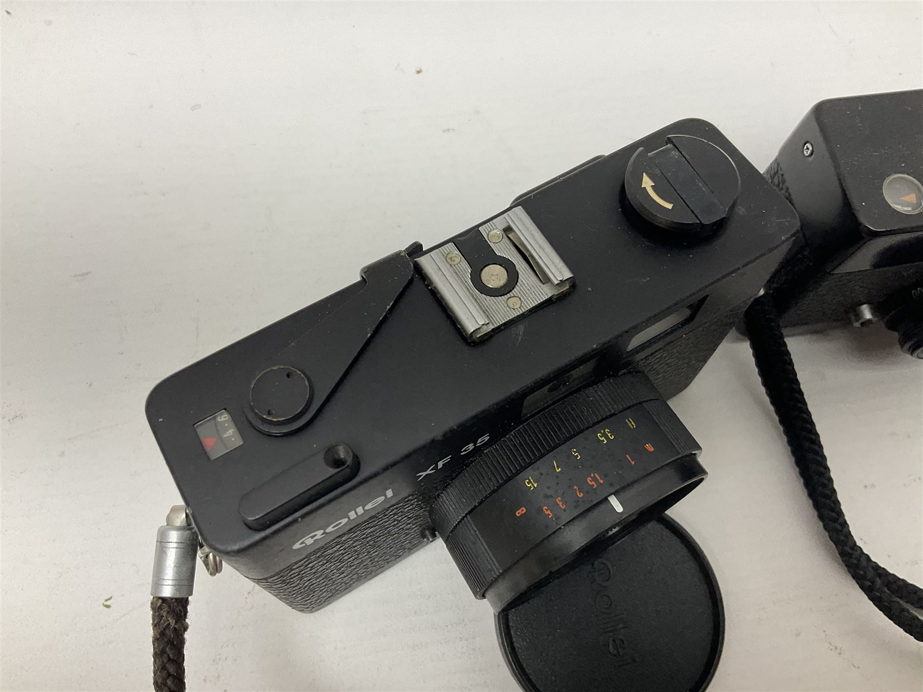 Three Rollei cameras, to include a Rollei 35 LED camera, with Triotar 3.5/40 lens and two Rollei XF 35 cameras, each with Sonnar 2.3/40 lenses