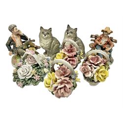 Two Royal Doulton cats, two Capodimonte style figures, and four ceramic baskets of flowers 