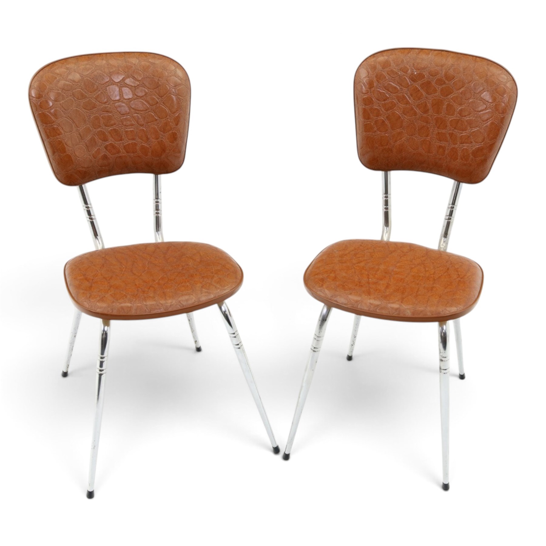 Pair of 20th century French chrome and crocodile effect bistro chairs, shaped padded back and seat upholstered in mock-croc faux leather on tapering chrome supports