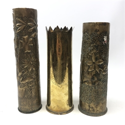  Three WW1 Trench Art Shell cases inscribed 'The Great War' and two others with floral embossed decoration H34cm max  