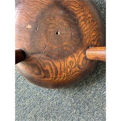 18th century ash and elm milking stool, circular figured top raised on cylindrical supports