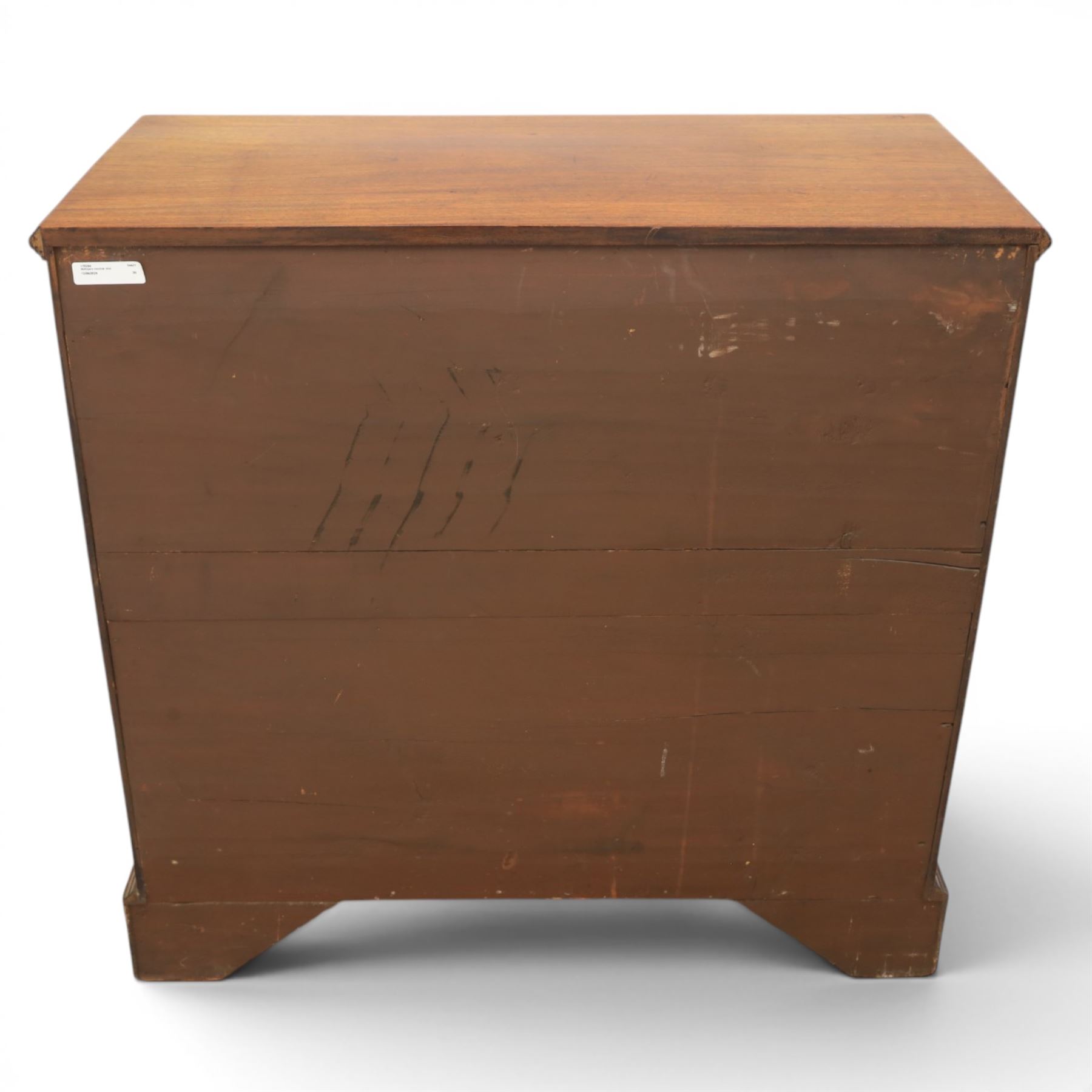 Early 20th century Georgian design figured walnut kneehole desk, rectangular moulded top over one long frieze drawer, kneehole recess with cupboard and drawer above, flanked by six short drawers with oval pressed brass handle plates, moulded plinth base on bracket feet