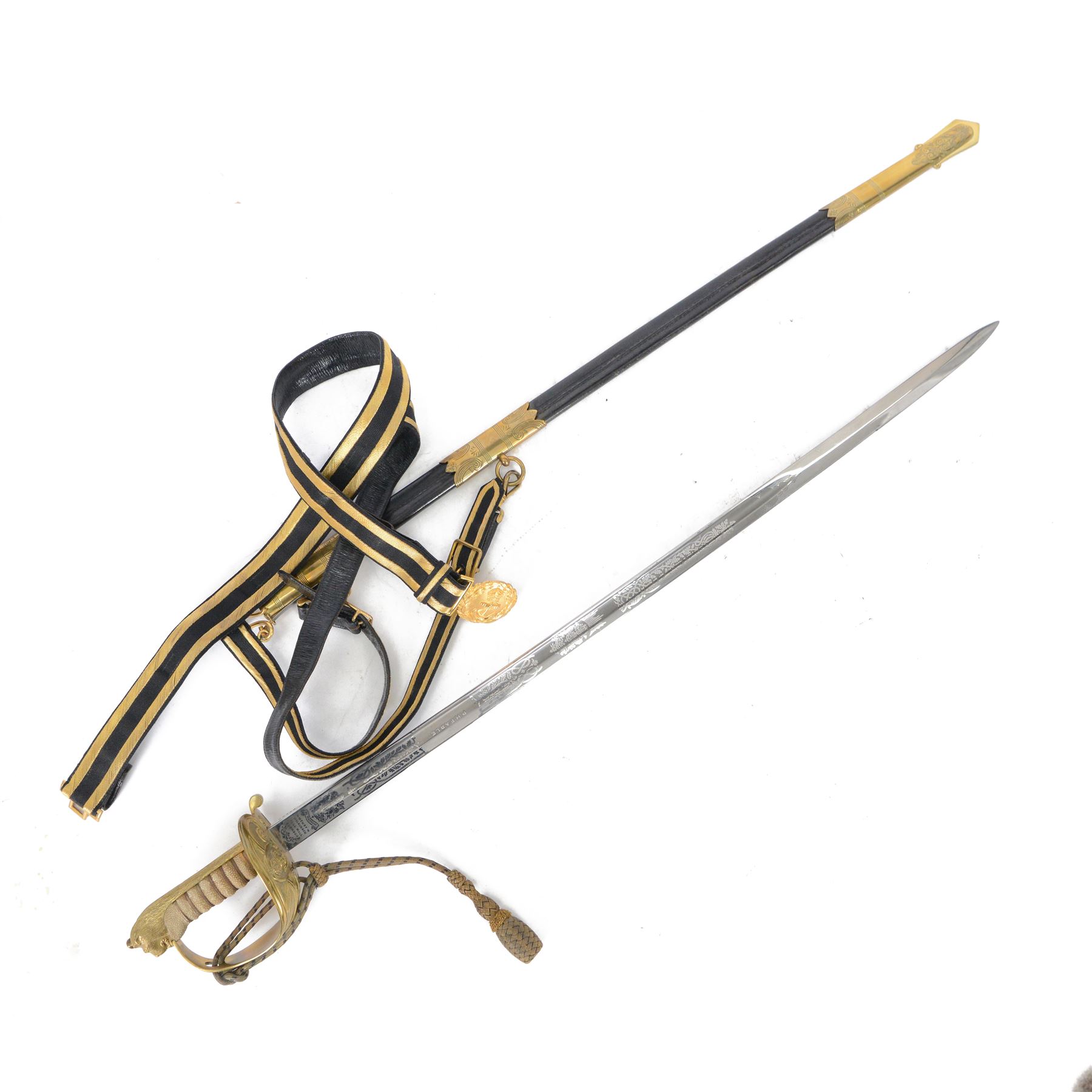 British 1827 pattern Naval officer's sword, named, by Wilkinson Sword Company in 1920 for P.H. Earle and retailed by Gives, the 80cm slightly curved blade etched to both sides, the brass guard held into scabbard by patent spring clip, lion head pommel and backstrap, with sword knot, within leather scabbard with three brass mounts, twin suspension rings and attached belt and suspension straps with gilt buckle and braid, overall L98cm 