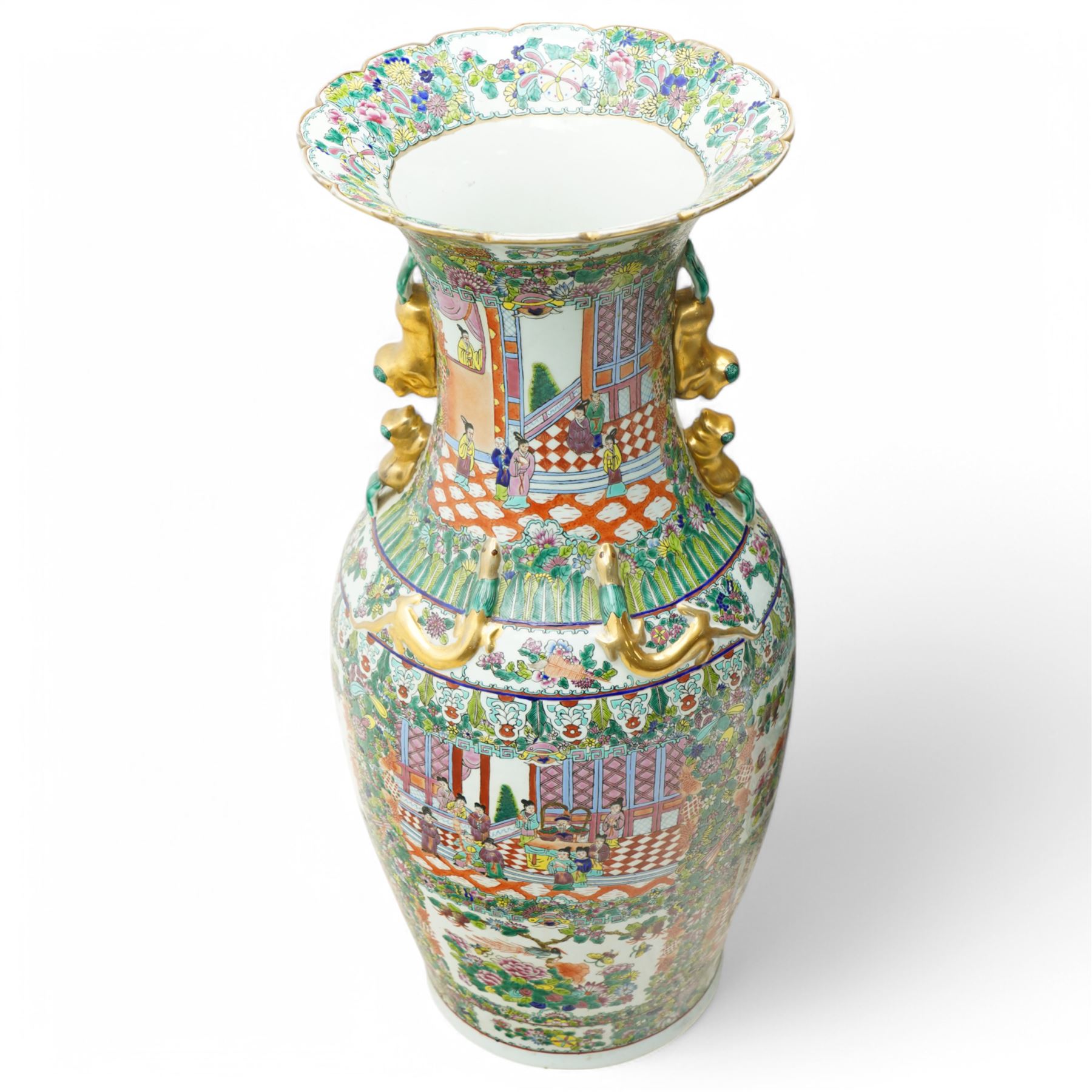 Pair of large 20th century Chinese famille rose floor vases, each of baluster form with waisted neck with gilt foo dog mounted shoulders, and lobed flared rim, decorated with alternating reserves of figures and birds and butterflies amidst blossoming flowers, the white ground profusely detailed with flower heads, each with character mark beneath, H87cm 