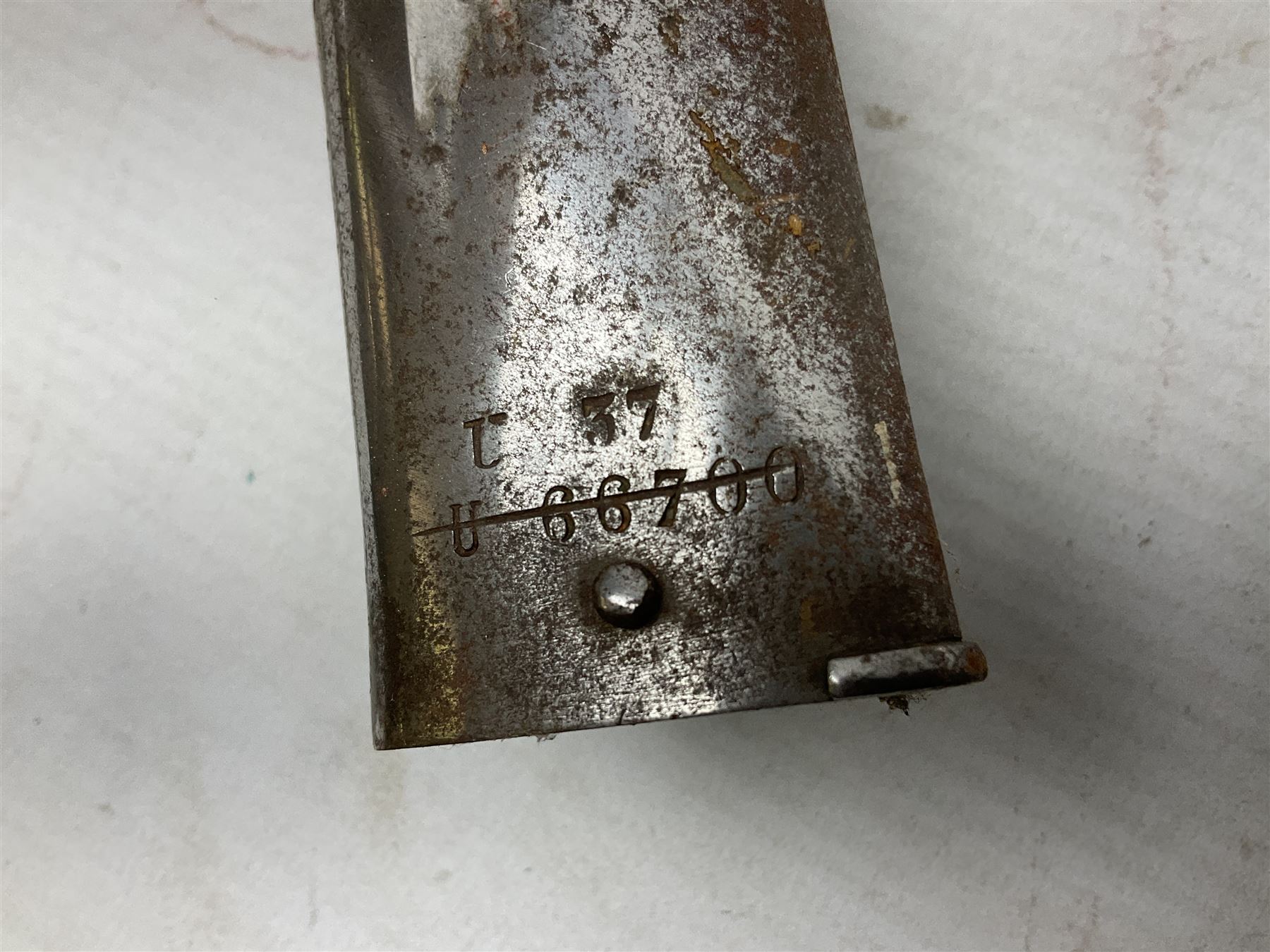 French model 1866 sabre bayonet, the 57.5cm curving blade marked St. Etienne 1873; in associated steel scabbard L71cm; and Mosin-Nagant M1891 socket bayonet with 43cm cruciform blade No.37068 (no scabbard) (2)