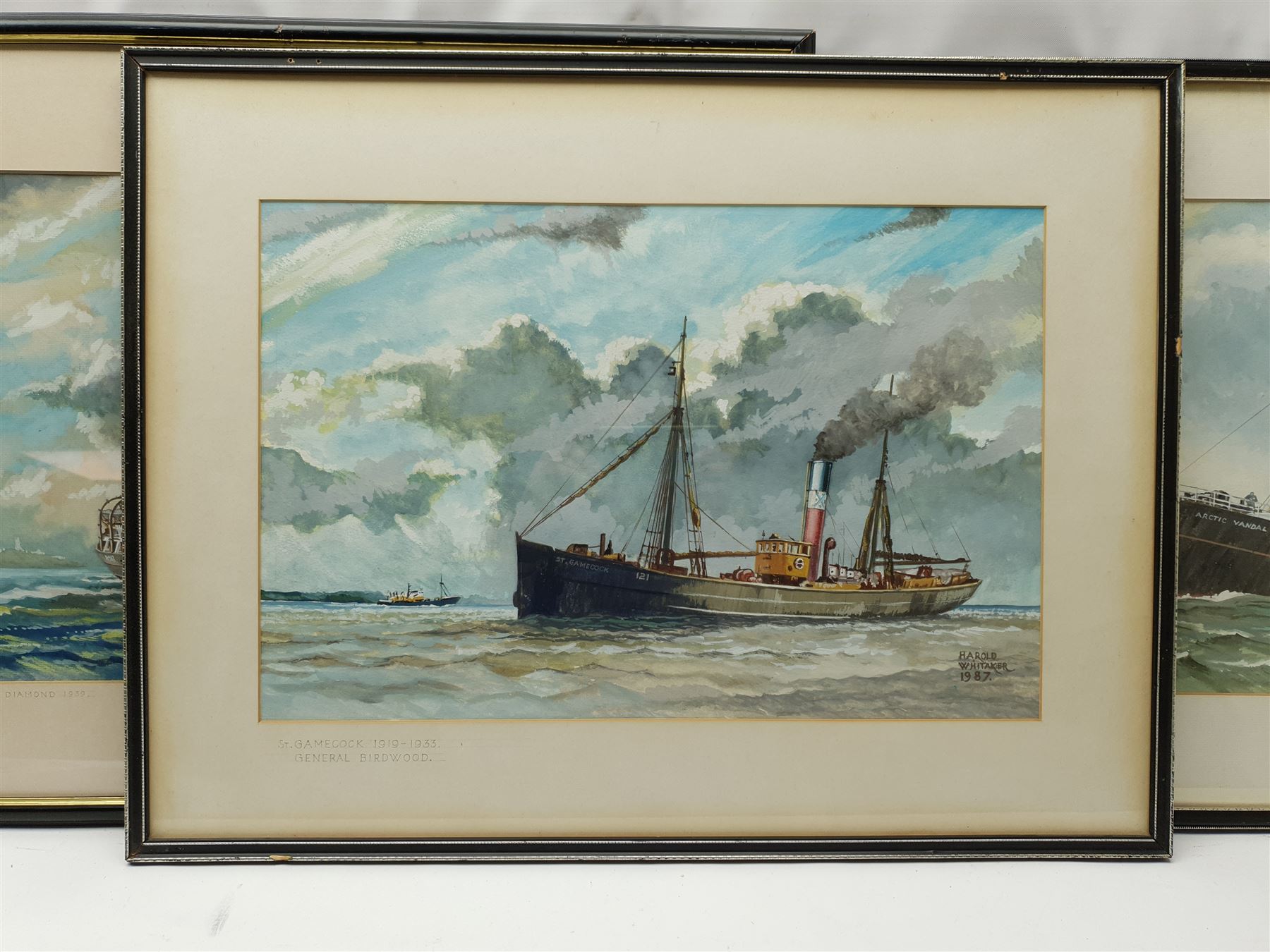 Harold Whitaker (British ?-1988): 'Kingston Diamond' 'St Gamecock' and 'Arctic Vandal', set three gouache ship's portraits signed and dated 1987, titled verso 32cm x 48cm (3)