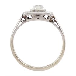 Art Deco platinum and white gold milgrain set diamond ring, circa 1920's, the central cushion cut diamond of approx 0.90 carat, with old cut diamond surround, total diamond weight approx 1.10 carat