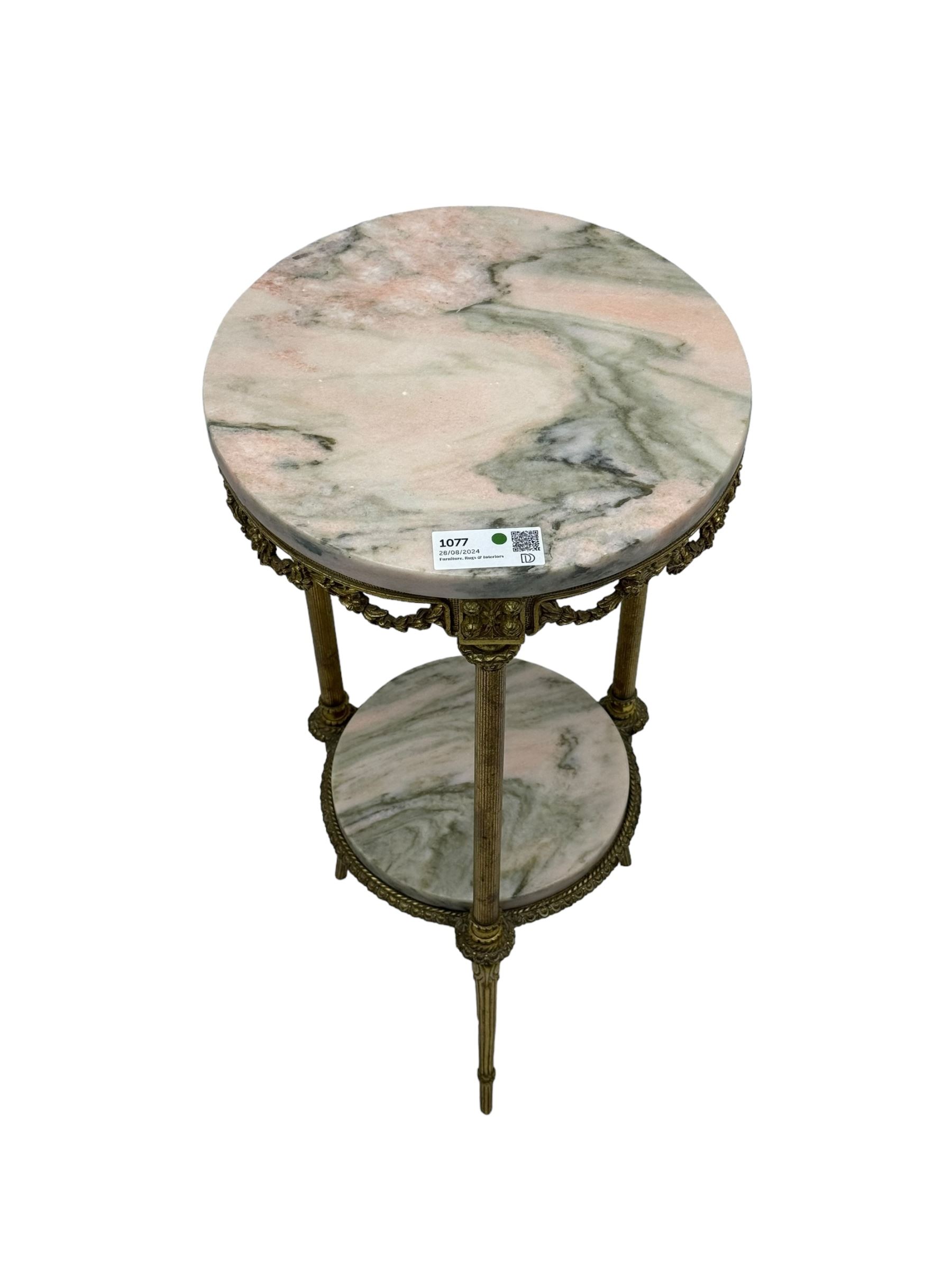 Late 20th century cast gilt metal and marble two-tier stand, pink and grey marble top and undertier, the base decorated with floral garlands, on reed moulded supports with splayed terminals 