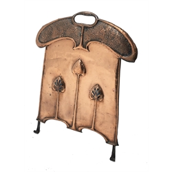  Art Nouveau period beaten and embossed copper fire screen, with stylized tulip motif set with Ruskin style cabochons, raised on wrought iron scrolling supports, H67cm x W48cm  