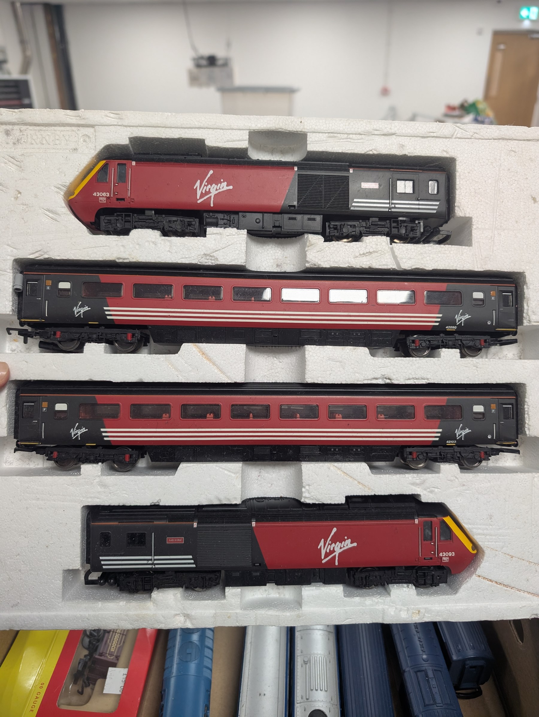 00 gauge model railway items, including Hornby Virgin HST 4 Car Train Set 'Maiden Voyager' and 'Lady in Red', Lima HST 4 Car set 'The Great Racer', other locomotives, rolling stock, track and accessories 