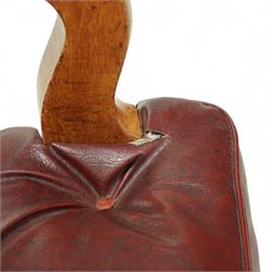 Impressive pair of mid-Victorian oak throne or hall chairs, arched backs on fluted supports with a deep buttoned upholstered panel and upholstered curved arms over fluted seat rails and tapering turned front legs with original brass and brown porcelain castors, and out-swept rear supports