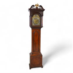 Johnathan Storr of York - 30 hour longcase clock c1770, in a later mahogany case with a decorative swan neck pediment, carved gilded eagle and fretwork, with a dogtooth moulding, break arch hood door and detached pilasters beneath, trunk with a conforming break arch topped door on a square plinth with raised moulding and bracket feet, brass arched dial with makers name to the arch, plain dial centre and silvered chapter ring with Roman numerals, five minute Arabic's, minute track and matching steel hands, chain driven movement with a countwheel strike on a bell. No Pendulum or weight.
Johnathan Storr was an 18th century York clockmaker, working from Petergate and Minster gates in the city centre.